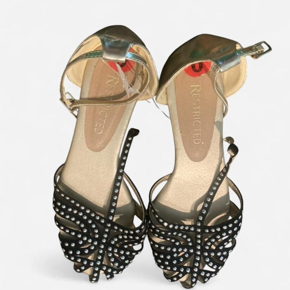 Restricted black gold studded